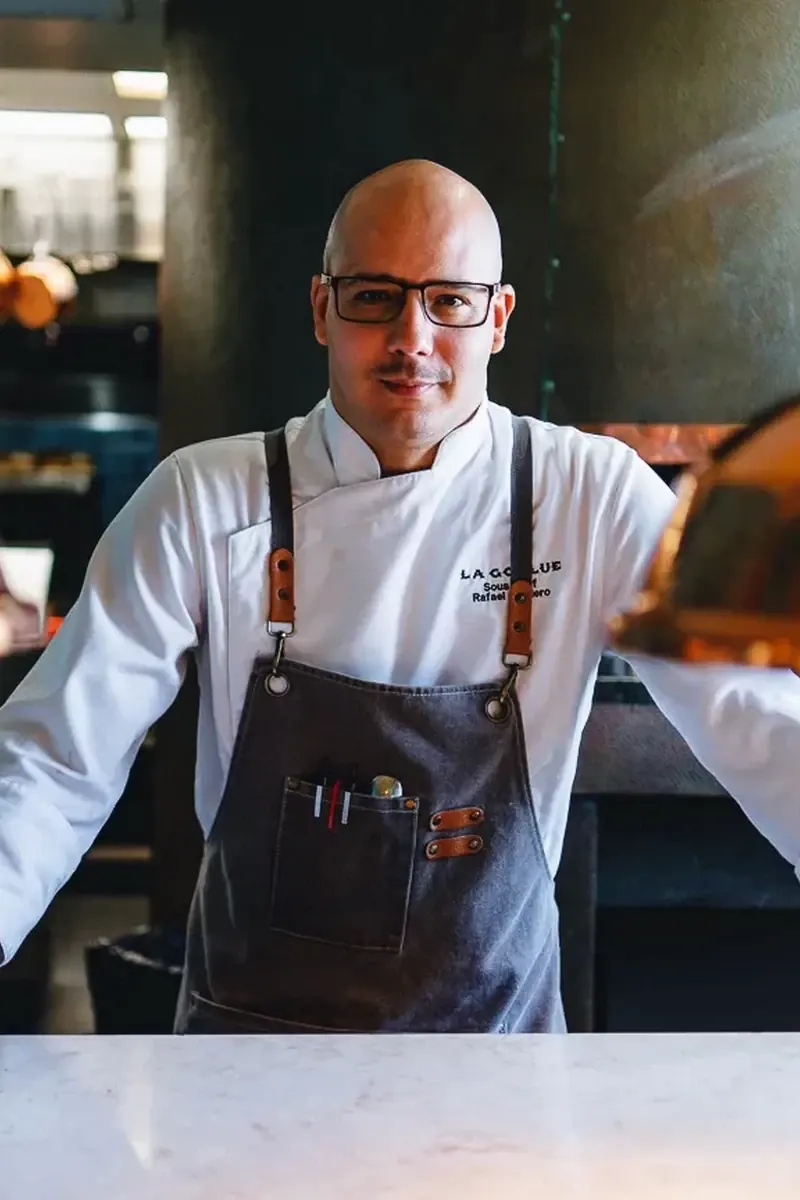 A chef at the pass in the kitchen