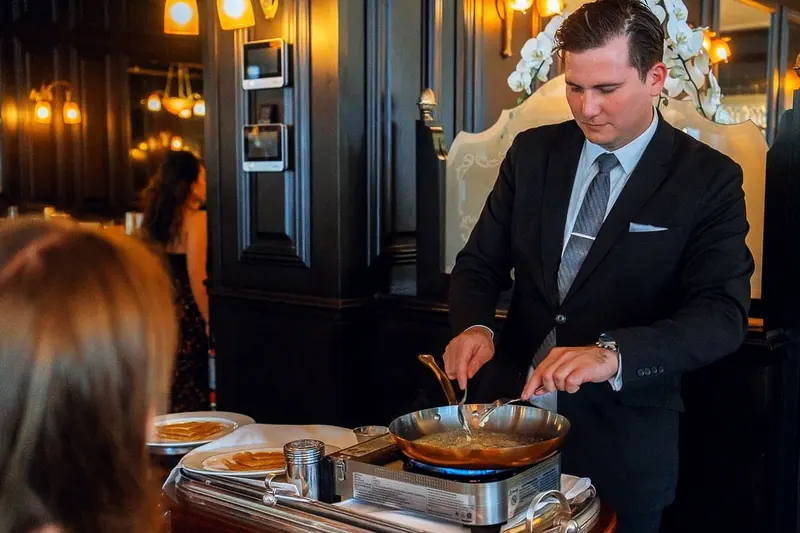 Crêpes Suzette flambéed tableside