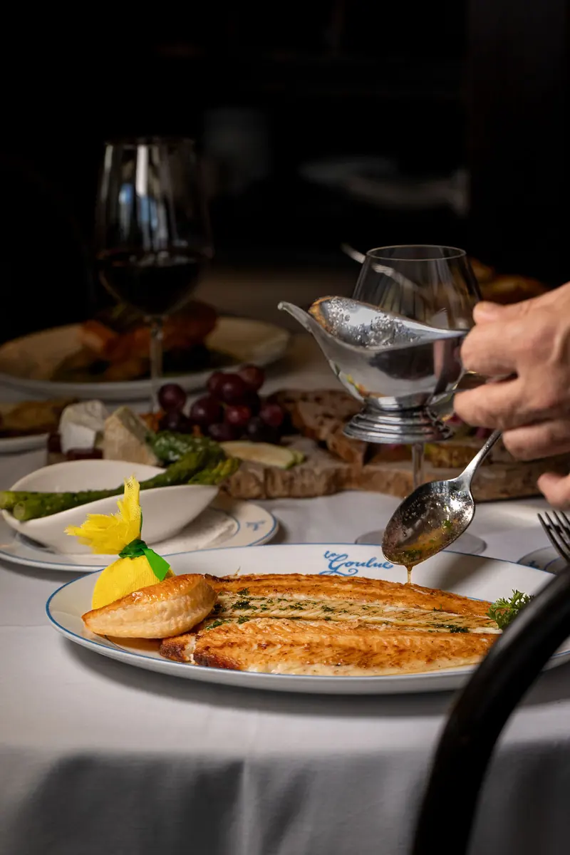 Sole Meunière being served at the table