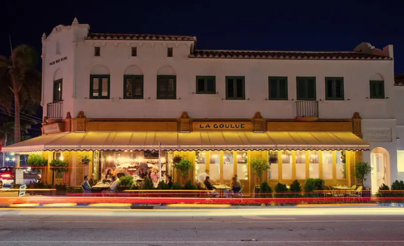 La Goulue on South County Road at night, its awning lit